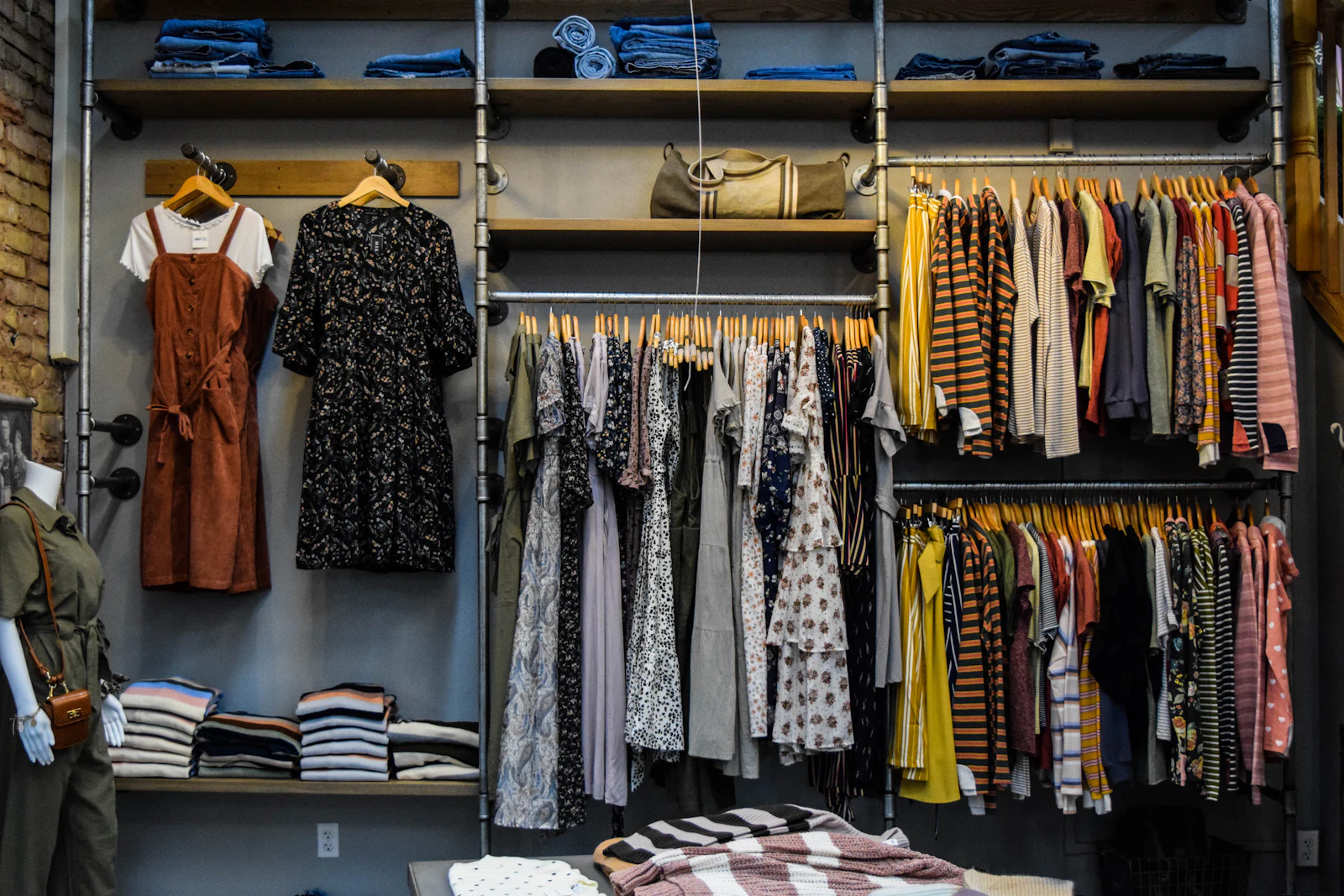 Boutique clothing store with open wardrobe-style display racks